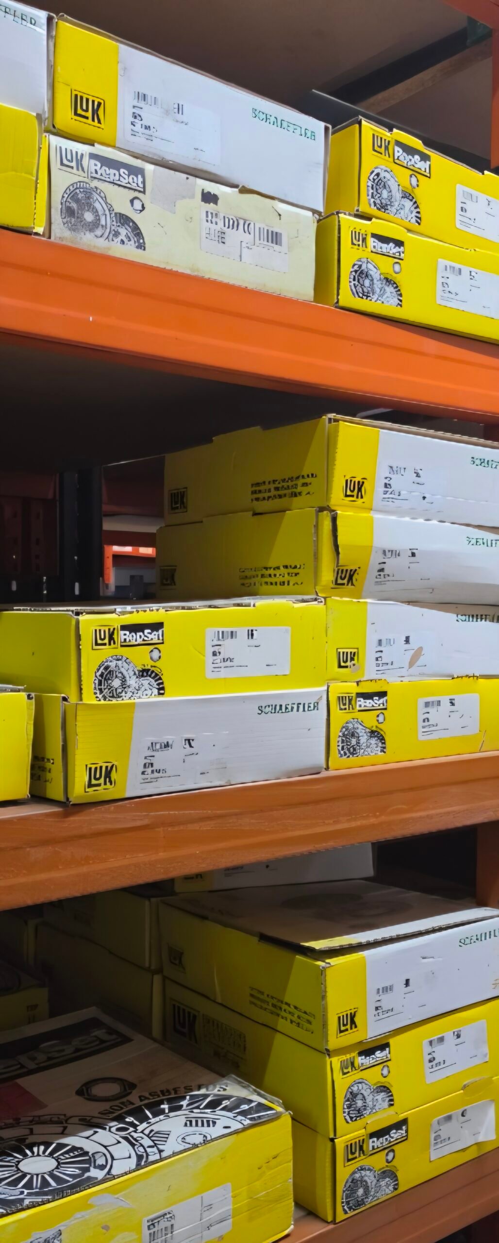 Shelves stocked with LuK clutch kit boxes