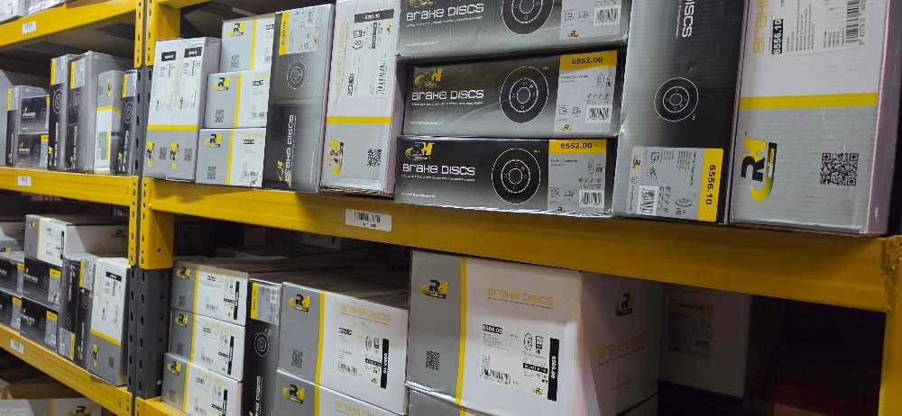 Shelves with boxed brake discs and pads