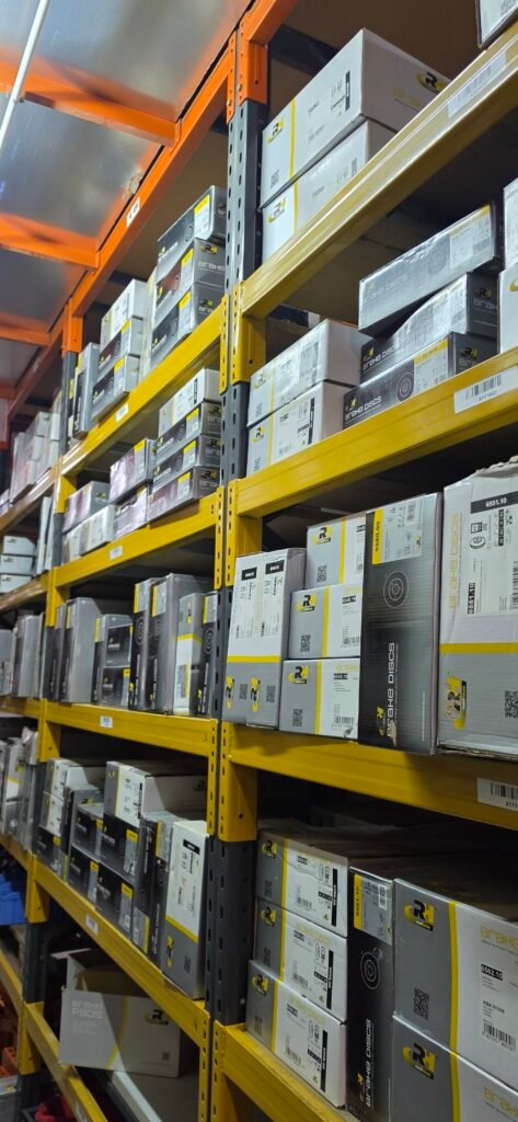 Warehouse shelving with boxed automotive spare parts
