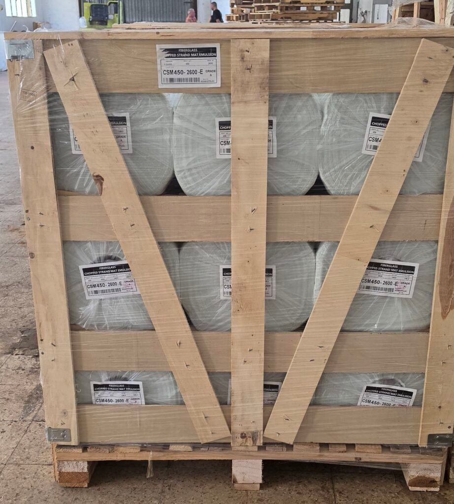 Open wooden crate showing fiberglass mat rolls inside