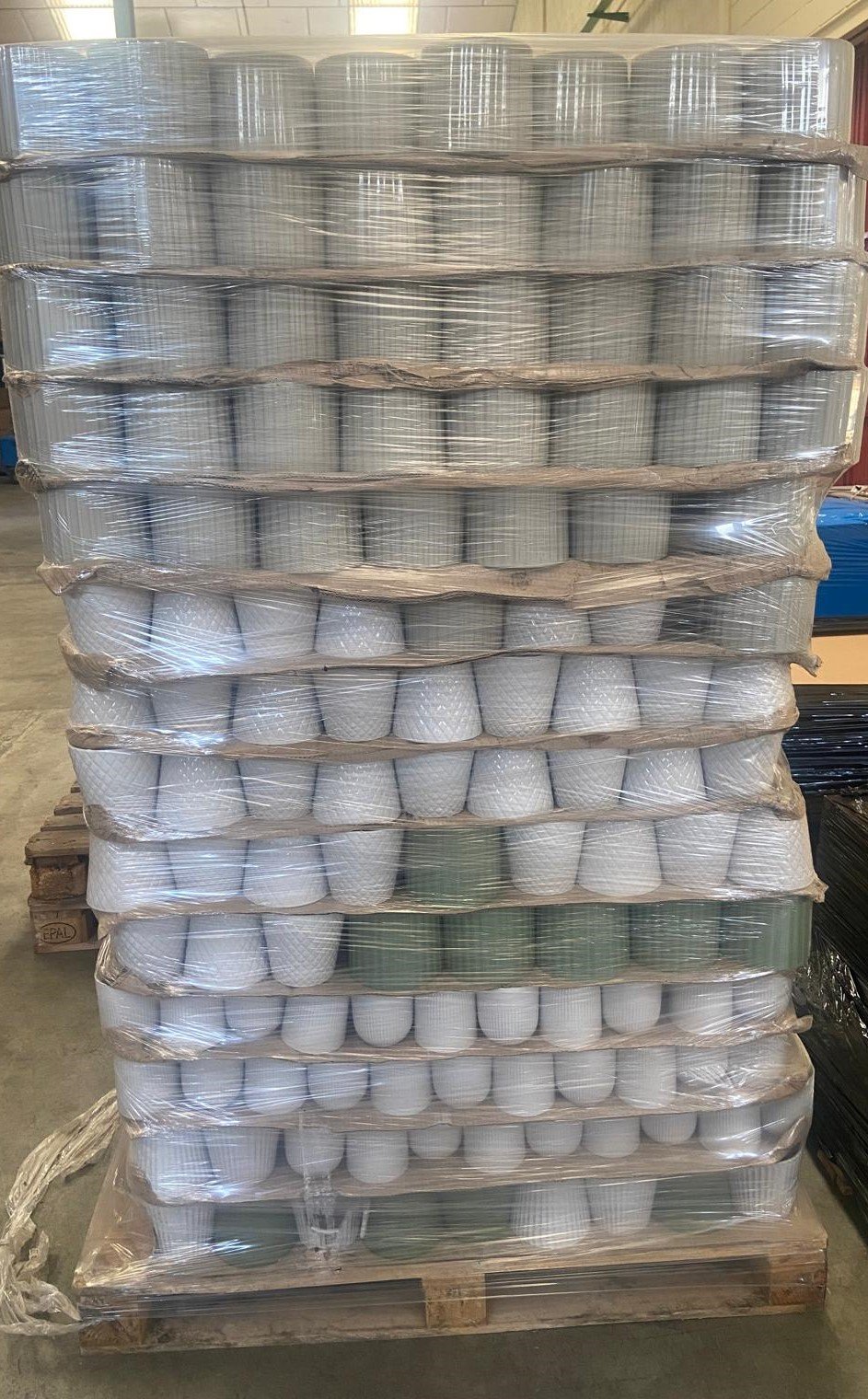 Pallet of glazed stoneware flowerpots, grey and white glaze